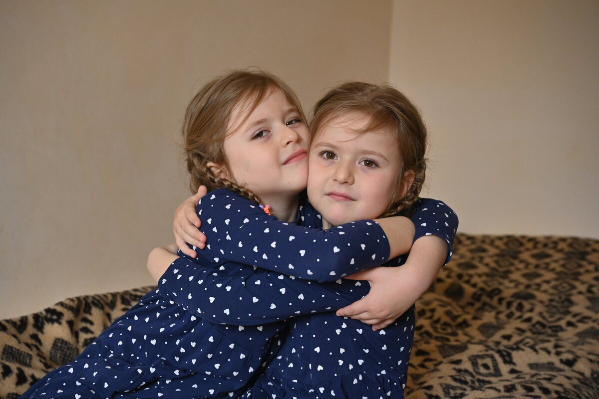 The two girls, Daria and Alexandra, are going to kindergarten in their new home in Etulia. The two girls, Daria and Alexandra, are going to kindergarten in their new home in Etulia.